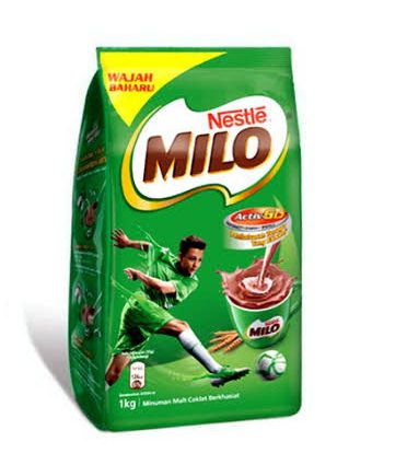 1 kg green Nestlé Milo chocolate malt drink powder package featuring a footballer kicking a ball and a glass showing the Milo swirl