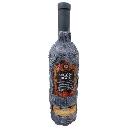 Decorative bottle of Asconi Agor liquor with a rough, gray textured coat and a dark label