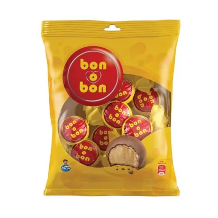 Bag of Bon o Bon chocolates in a yellow package with a red circular logo; one piece bitten to show creamy filling inside