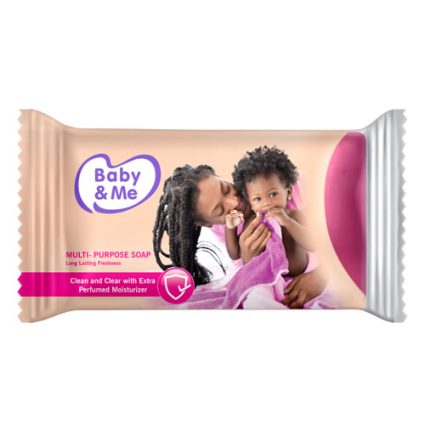 Packaged Baby & Me multi-purpose soap on a peach-pink wrapper showing a mother kissing her baby, highlighting moisturizing formula.