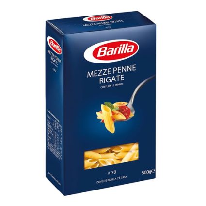 Box of Barilla Mezze Penne Rigate pasta (500 g) on a blue package with brand logo and cooking time noted (11 minutes).