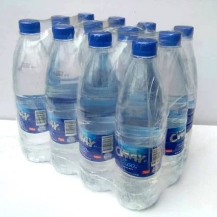 Pack of twelve plastic water bottles with blue caps arranged in a cluster on a white surface, labeled water bottles in a multipack.