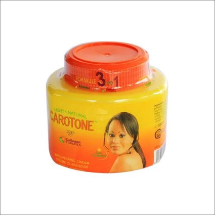 Yellow Carotone lightening cream jar with red screw-top lid, gradient label and a model's portrait on the front.