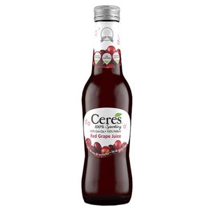 Bottle of Ceres Red Grape Juice with a white label and silver cap