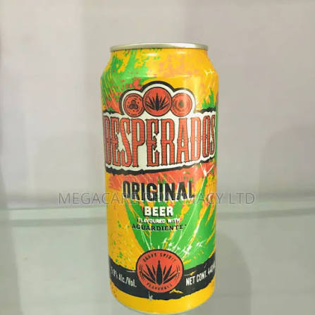 Desperados Original Beer 440ml - Imavug Canned Desperados Original beer with bright yellow‑green label on a reflective surface, showing tequila‑flavored beer branding.