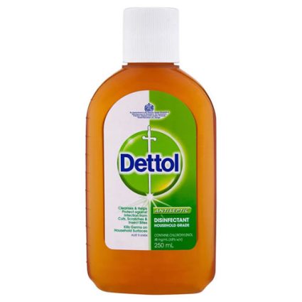 Bottle of Dettol antiseptic disinfectant with white cap; amber liquid and Dettol logo on the label, 250 mL.
