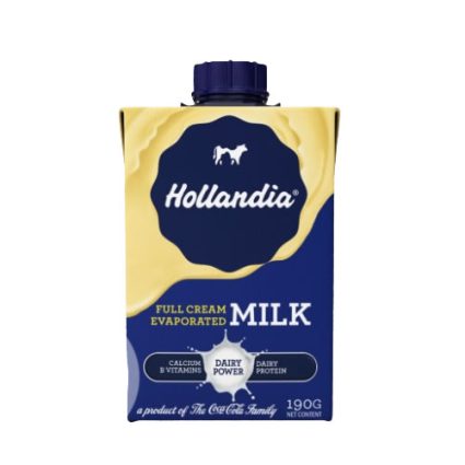 Hollanda full-cream evaporated milk carton with blue label, white logo, and blue cap