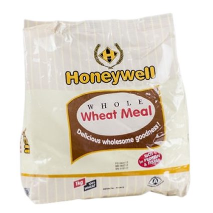 Bag of Honeywell Whole Wheat Meal flour (1 kg) with yellow logo and label on a white background