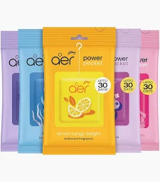Row of colorful Aer Power Pocket laundry detergent sheets, orange-centered pouch with a lemon graphic.