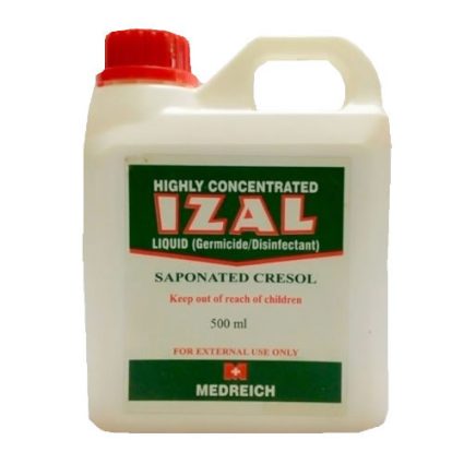 White plastic bottle of highly concentrated IZAL disinfectant with a red cap and green label reading 'Highly Concentrated IZAL' and 'Saponated Cresol' (500 ml). Used for external disinfection only.