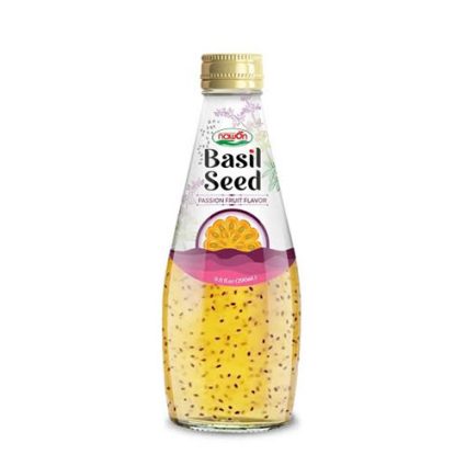Bottle of Basil Seed drink, passion fruit flavor, with visible seeds in yellow liquid and a gold cap surface.