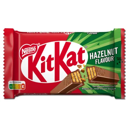 KitKat Hazelnut flavor chocolate bar in red and green wrapper, Nestlé logo visible on the package.