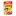 Kellogg's Coco Pops cereal box with a cartoon dog mascot, bright yellow background, milk splash, and 'Jumbo' chocolate maize cereal label.