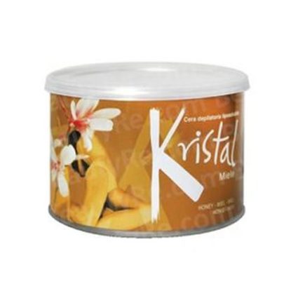 Canned fruit product with an orange label reading 'Kristal' and sliced mangoes pictured on the side.