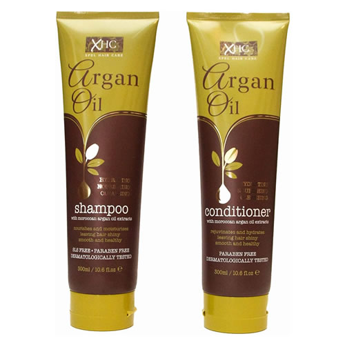 Large Argan Oil Shampoo and Conditioner Set 300mL Each - Imavug Two Argan Oil bottles, shampoo and conditioner, in yellow and brown packaging on a white background.