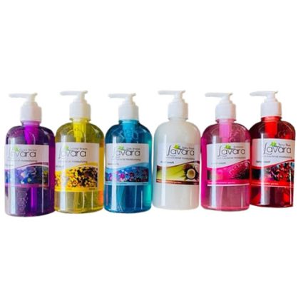 Six colorful liquid hand soap bottles with pumps arranged in a row: purple, yellow, blue, white, pink, and red.