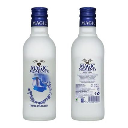 Two white Magic Moments vodka bottles with blue caps shown from front and back, displaying branding on the labels.