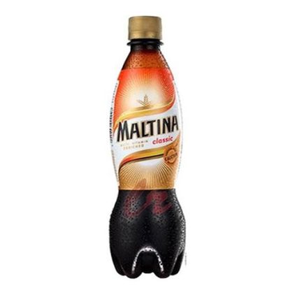 Maltina Classic soft drink bottle with a gold cap and orange label.