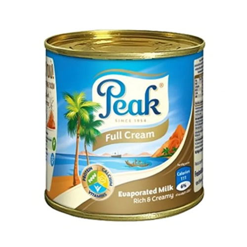 Peak Full Cream Liquid Milk - Imavug Can of Peak Full Cream Evaporated Milk featuring a tropical beach label with palm trees.