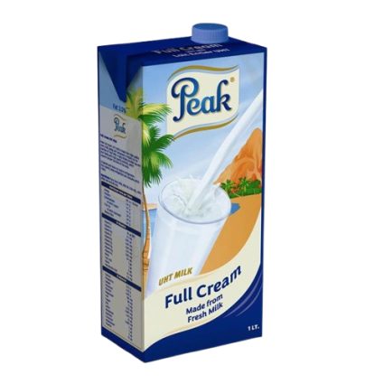 Blue Peak brand UHT full-cream milk carton (1 L), with splash of milk into a glass and tropical scenery on the label