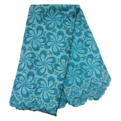 Turquoise lace fabric with teal floral embroidery and a scalloped edge](Turquoise lace fabric with teal floral embroidery and a scalloped edge)