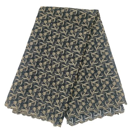 Fabric with a dark blue background and a gold floral vine pattern with swirling leaves and star-like flowers, scalloped edge at bottom.