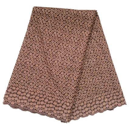 Brown fabric with a repeating circular geometric pattern and scalloped edge