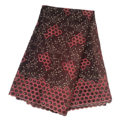 Brown fabric with red circular embroidery and delicate gold vine patterns, scalloped hem.