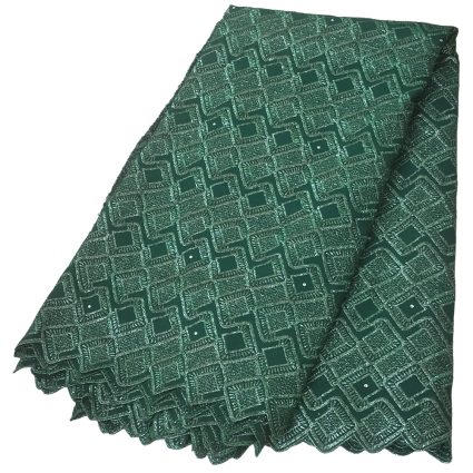 Green fabric with a repeating geometric square pattern, folded to show texture and edges.