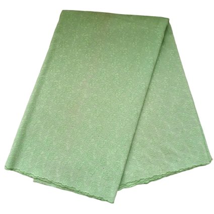 Light green lace fabric folded with a subtle floral pattern.