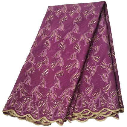 Folded purple fabric with gold leaf-like patterns and a scalloped beige border, resembling African wax print cloth ready to use