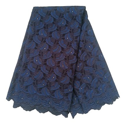 Navy blue lace fabric with paisley patterns and scalloped hem, shown as an elegant layered garment edge detail
