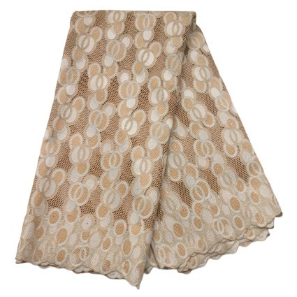 Beige lace fabric with repeating circular interlocking pattern and scalloped edge