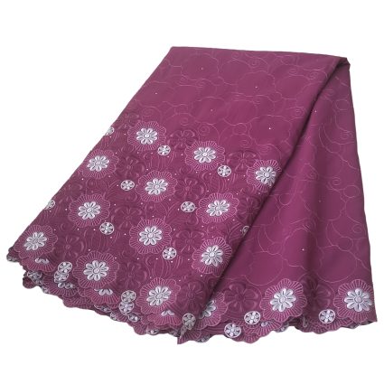 Purple lace fabric with white floral embroidery and scalloped edge, folded neatly.