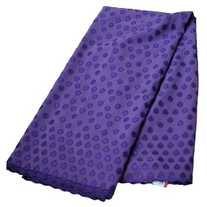 Purple scarf with dark purple polka dots, folded to show scalloped lace edge at the bottom.