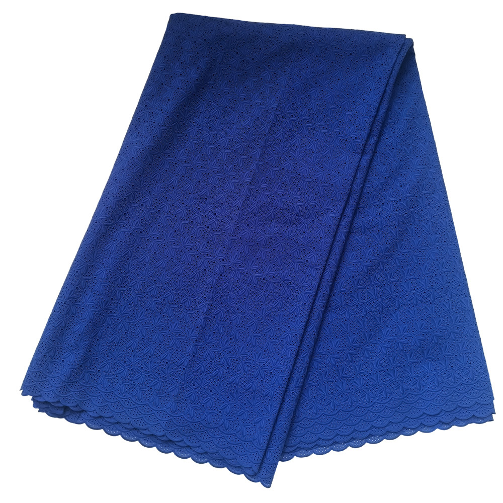 Premium Royal Blue Swiss Voile Dry Lace Fabric with All-Over Floral Starburst Embroidery Eyelet Scalloped Borders 5 Yards - Imavug Blue lace fabric folded neatly, showing a floral pattern and scalloped edges.