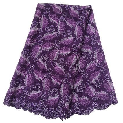 Purple short skirt with pink and white swirling feather patterns and a scalloped hem.