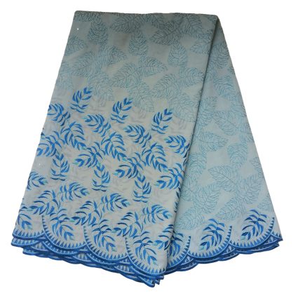 Light gray fabric with blue leaf pattern, folded to show a scalloped blue border edge.
