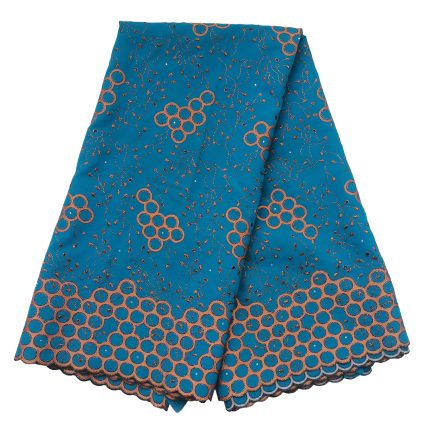 Teal skirt with orange circular embroidery and vine motifs, scalloped hem edging.