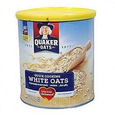 Can of Quaker Oats Quick Cooking White Oats with a yellow lid and blue label