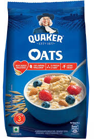 Blue Quaker Oats oatmeal package with a bowl of prepared oats topped with berries on the front front label.