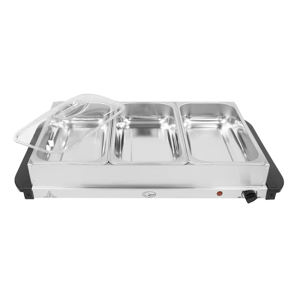 Quest 16510 Large Buffet Server and Warming Tray 3 - Imavug Three-section stainless steel chafing dish with clear lid on an electric food warmer.