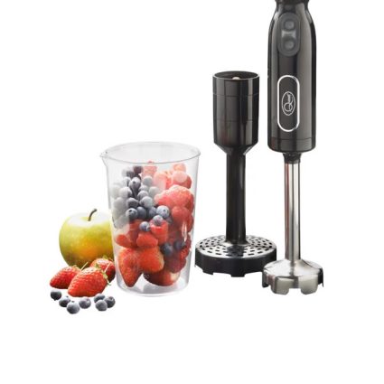 Immersion blender with detachable blade and blending cup, shown with fresh berries and a green apple nearby.