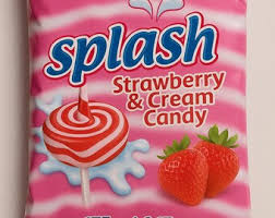 Packaging of Splash Strawberry & Cream Candy featuring a red-and-white swirl lollipop and strawberries on a pink bag.