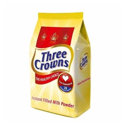 Yellow Three Crowns instant filled milk powder bag with red crest logo and 'The Healthy Choice' badge on front.