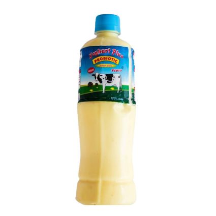 Plastic bottle of probiotic yogurt drink with a blue cap and cow-label illustration