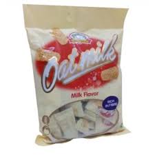 Front of a beige snack bag labeled 'Oatmilk Milk Flavor' with images of cookies and a few individually wrapped pieces shown at the bottom.