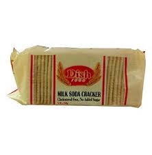 Front of a beige snack package labeled 'Milk Soda Cracker' with a red Dish Foods logo, showing red stripes on the sides.