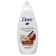 Dove Purely Pampering body wash bottle with a curved white design and a label showing the Dove logo and an almond with a flower illustration on the front.