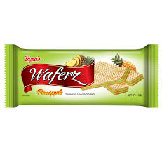 Pineapple-flavored wafer snack in a bright green wrapper with the word 'Wafers' visible and an image of sliced pineapple on the package.